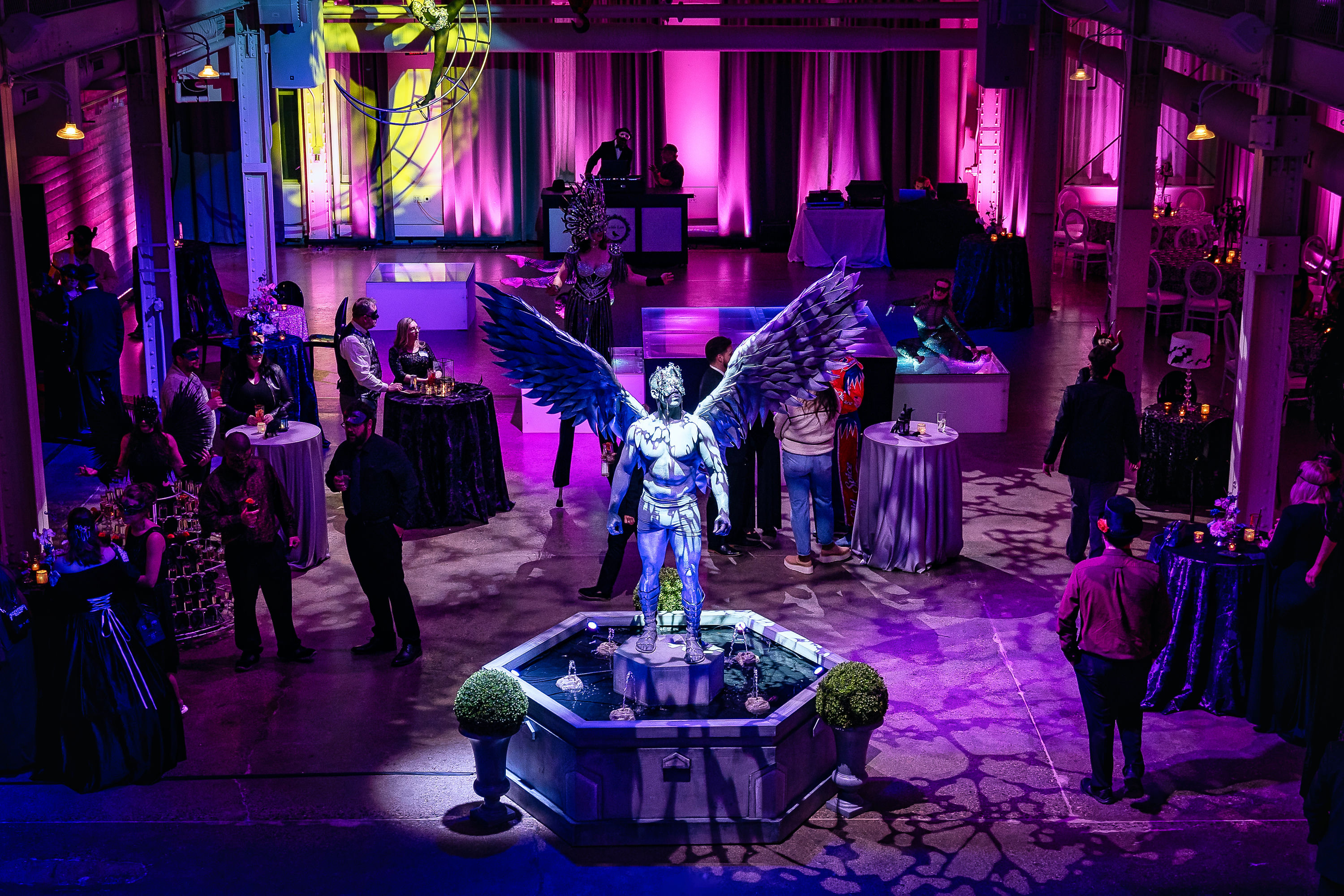 Midnight Masquerade ILEA award winning immersive corporate event at Machine Shop Minneapolis, masked aerialist performers