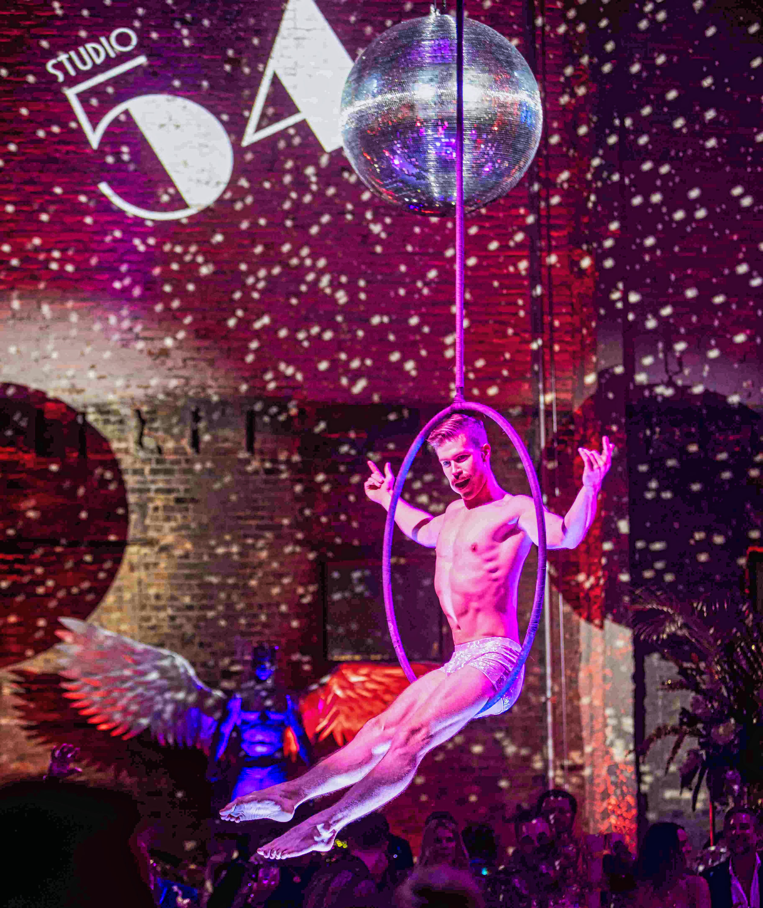 Performers and guests merged on the dance floor, 80 elite performers creating immersive Studio 54 party atmosphere