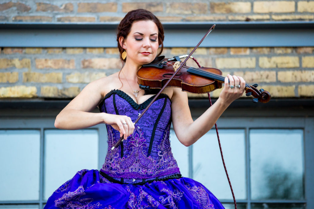 Purple Violinist Archway- Enticing Entertainment Showcase - Experience the Seasons